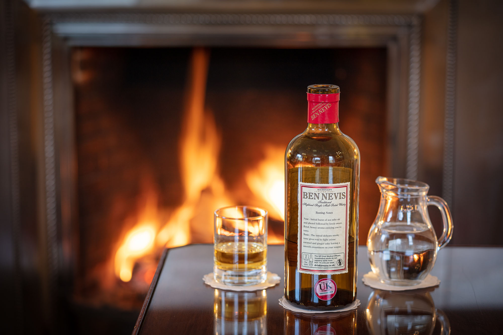 Enjoy a single malt whisky by a log fire